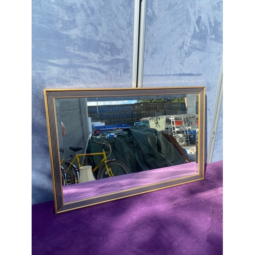 684 - Modern gilt frame beveled edge rectangular mirror.