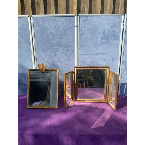 687 - Two gilt framed free standing dressing table mirrors.