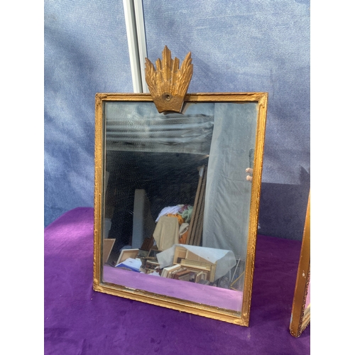 687 - Two gilt framed free standing dressing table mirrors.