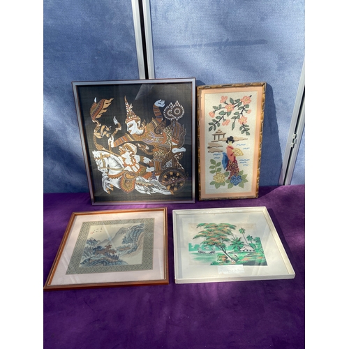 695 - A collection of oriental inspired tapestry/material art works