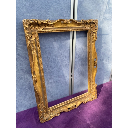 698 - Ornate gilt frame See images for all dimensions.