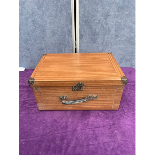 212 - Vintage Singer sewing machine in carry case.