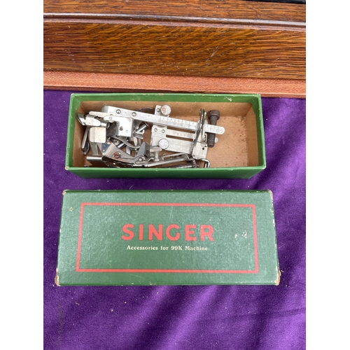212 - Vintage Singer sewing machine in carry case.