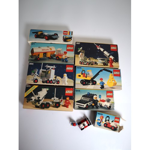 210 - Vintage Boxed Lego City & Space sets including 695, 897, 671, 6678, 894, 644, 6870 & 6609