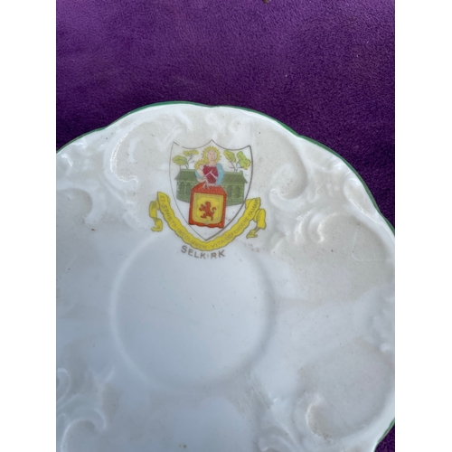 217 - A collection of miscellaneous ceramics including plates and mugs.