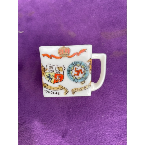 217 - A collection of miscellaneous ceramics including plates and mugs.