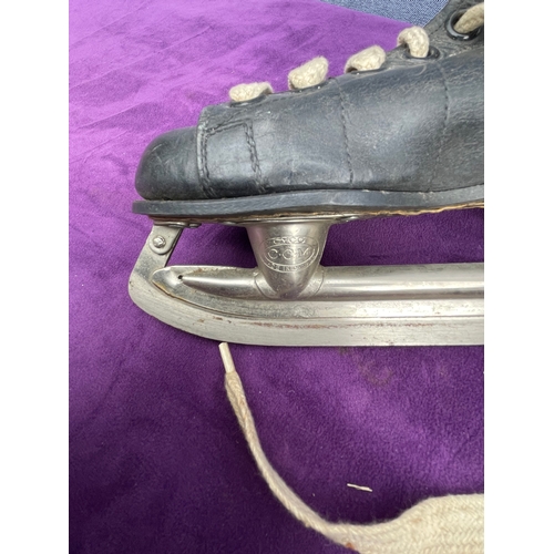 218 - Signed Mitre Rugby ball and vintage skates.