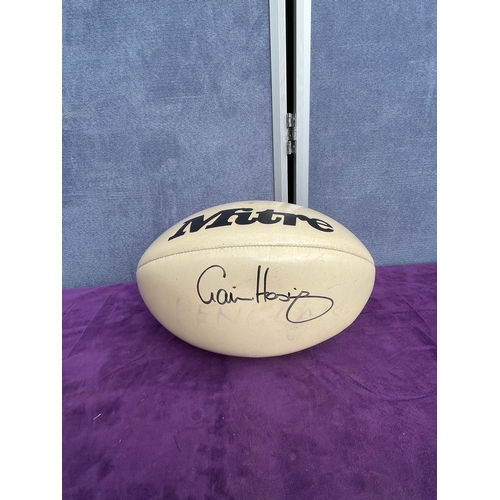 218 - Signed Mitre Rugby ball and vintage skates.