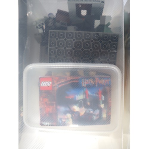 192 - LEGO Harry Potter & Studio - 4755 Knight Bus, 2 boxes of misc harry Potter Pieces & 1351 Studio Movi... 