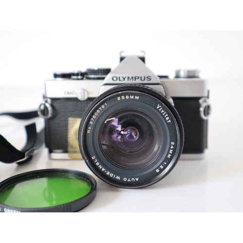 45 - Olympus 35mm Cameras - OM 1 n w/ 1:1,8 50mm lens & OM 2 n w/ Vivitar 1:2.8 24 mm lens