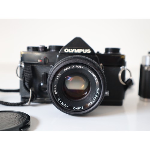 46 - Olympus 35mm Cameras - OM-1 w/ 50mm 1:1,8 Lens & OM-1n w/ 50mm 1:1 1,8 lens