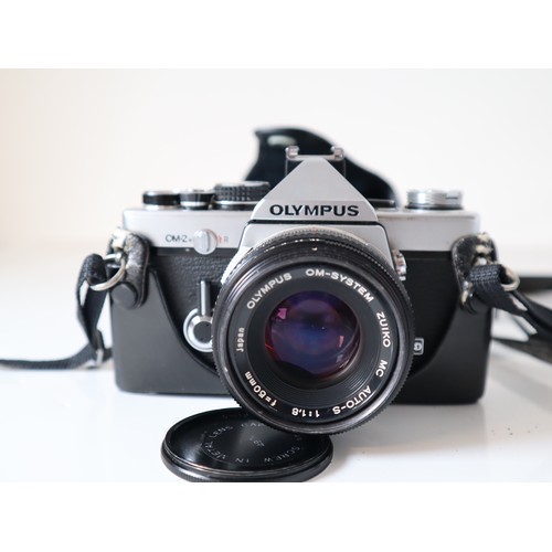 49 - Olympus 35mm Cameras - 35 SP w/ 1:1,7 42mm lens & OM-2 n w/ 1:1,8 50mm lens