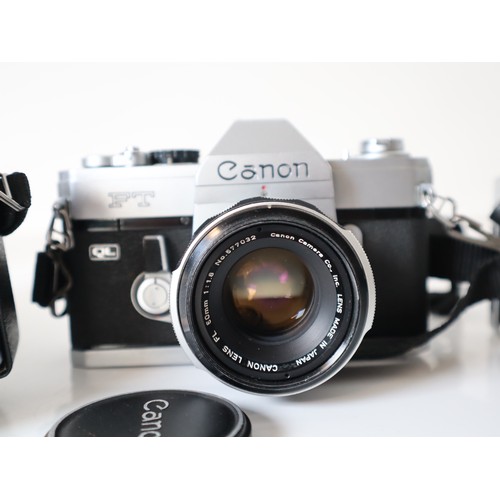 55 - Canon 35mm Cameras - FT QL w/ 1:1,8 50mm Lens, G-III QL w/ 1:1.7 40mm Lens, G-111 QL w/ 1:1.9 45mm l... 