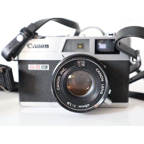 55 - Canon 35mm Cameras - FT QL w/ 1:1,8 50mm Lens, G-III QL w/ 1:1.7 40mm Lens, G-111 QL w/ 1:1.9 45mm l... 