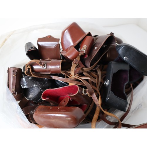 91 - Quantity of vintage branded leather camera cases approximately 30