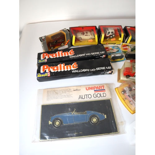 156 - A group of 1970-90's boxed model cars metal & plastic including Corgi, Dinky, Norev, Praline + other... 