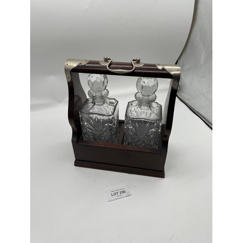 230 - Two Decanter Tantalus with key