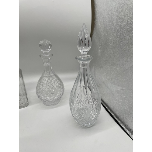 235 - Seven crystal decanters