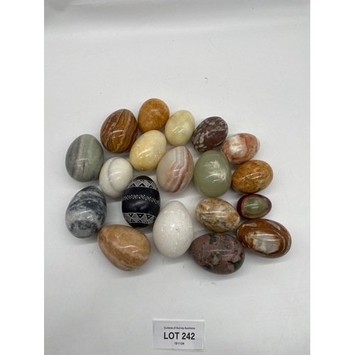 242 - A collection of miscellaneous polished Marble/Onyx eggs.