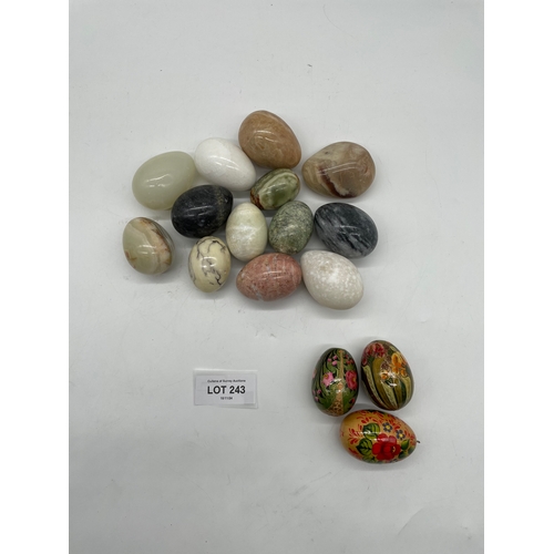 243 - A collection of Marble/Onyx/Decorative eggs.