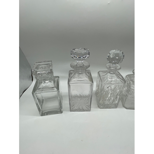 244 - Six crystal & cut glass decanters