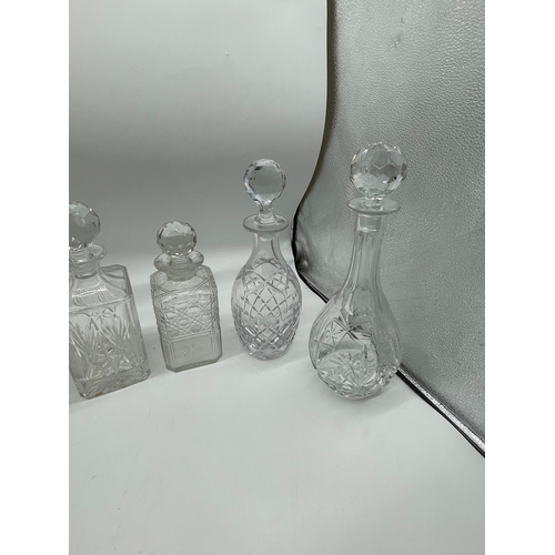244 - Six crystal & cut glass decanters