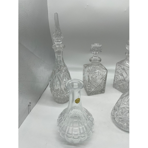 246 - Eight Crystal and cut glass decanters