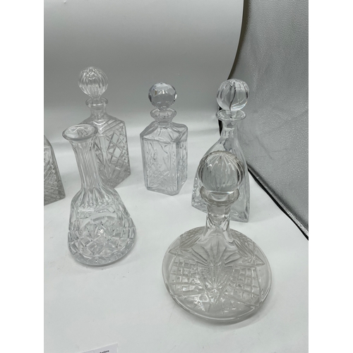 246 - Eight Crystal and cut glass decanters