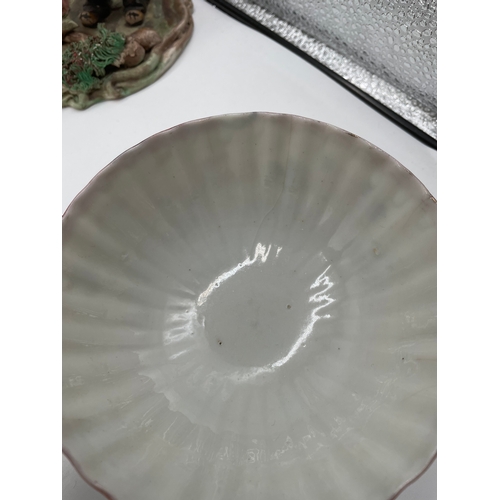 247 - A lot of miscellaneous ceramics/glassware and book ends