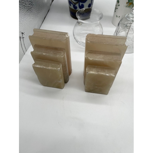 247 - A lot of miscellaneous ceramics/glassware and book ends