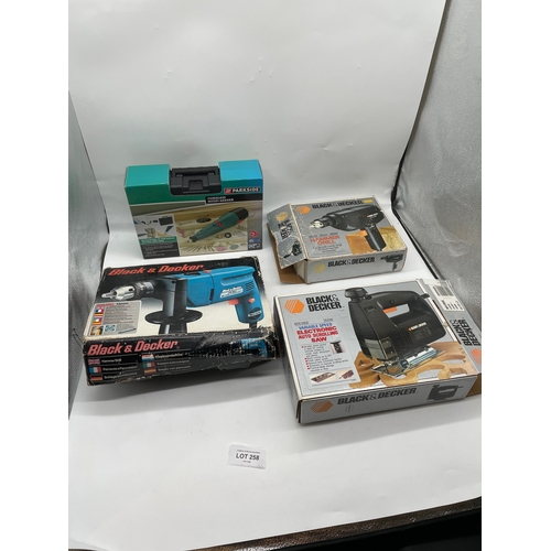 258 - A selection of boxed power tools including Black and decker hammer drills, scrolling saw and Parksid... 