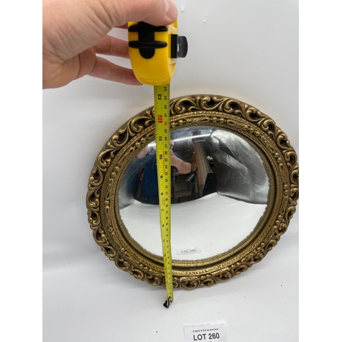 260 - Small circular butlers gilt framed mirror