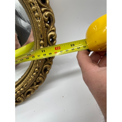 260 - Small circular butlers gilt framed mirror