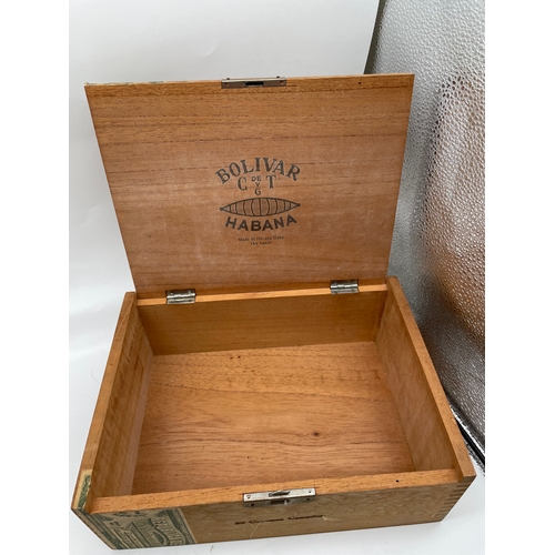 277 - A quantity of miscellaneous collectable items including a vintage Mercedes clock, wooden cigar box, ... 