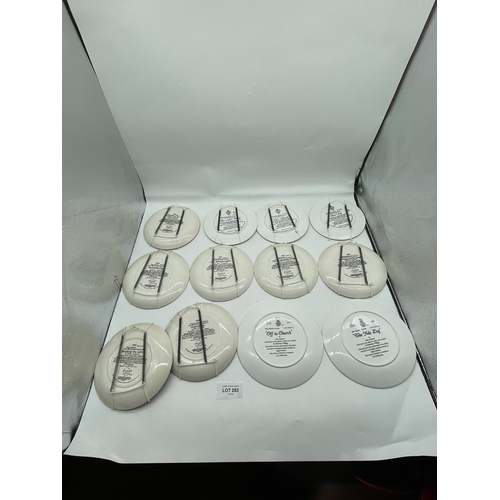 282 - Twelve collectable Wedgewood/Royal Doulton plates