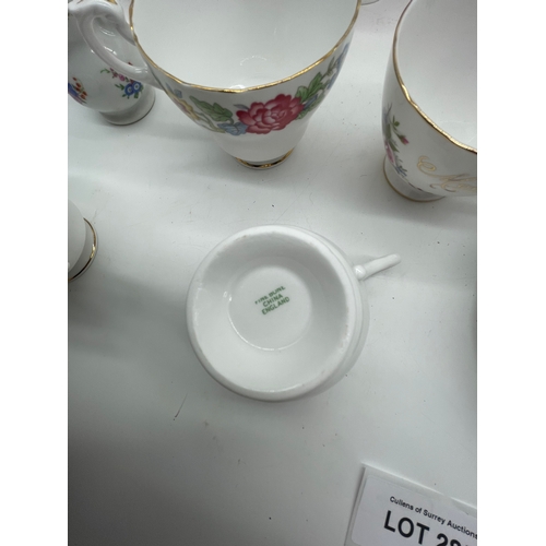 285 - A quantity of miscellaneous ceramic plates, Mugs and Teapot.