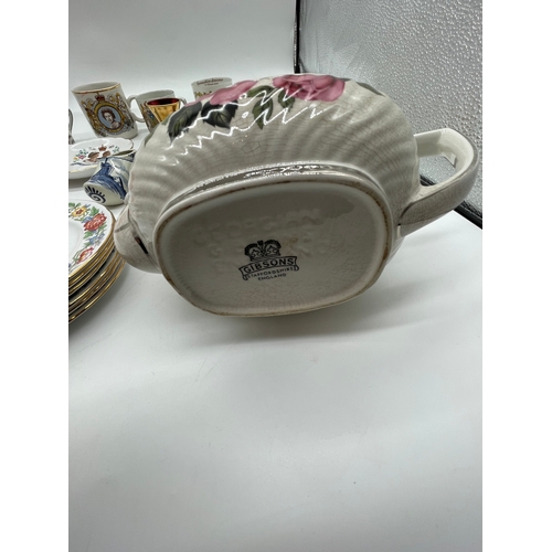 285 - A quantity of miscellaneous ceramic plates, Mugs and Teapot.