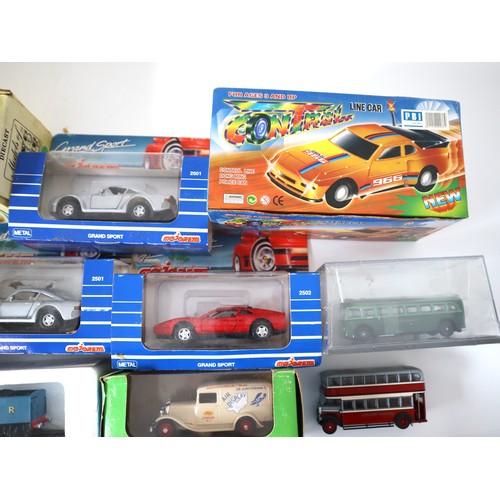 155 - A group of boxed models including plastic Norev cars, unused in retail box Praline Serie 1:87 Merced... 