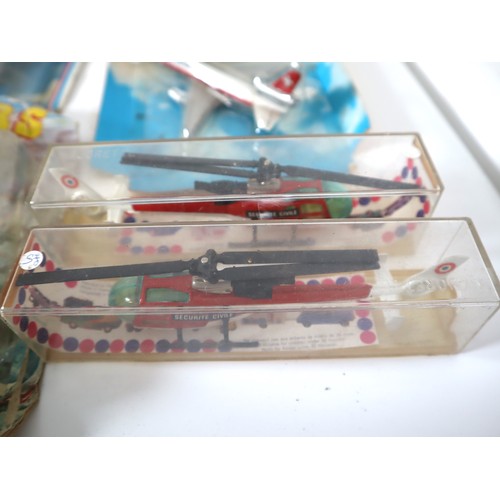 165 - A group of 1980-90's metal and plastic model aircraft from Ertl, Corgi, Majorette + others