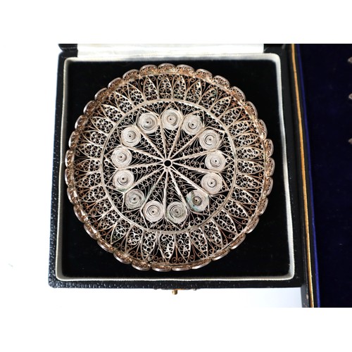 182 - Collection of early 20th century cased Sterling Silver cutlery + white metal filigree coaster