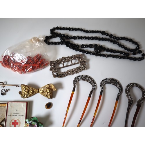 184 - A group of early 20th century jewellery including Sterling Silver belt buckle, Silver 1895 2 Shillin... 