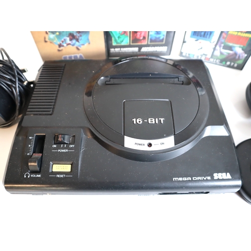 32 - Sega Mega Drive 16 Bit Console with two Controllers and 3 Games