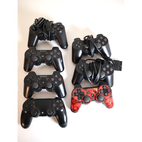 49 - 7 x Playstation Controllers wired & Wireless