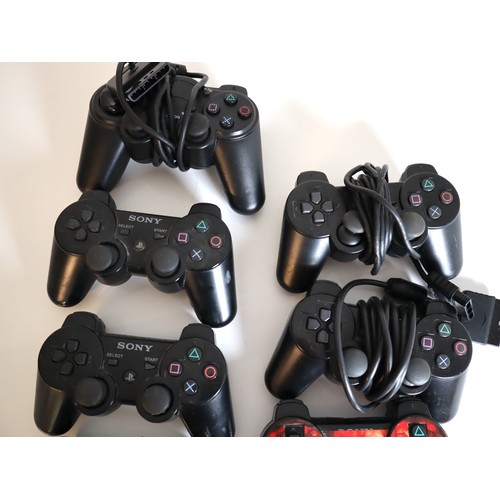 49 - 7 x Playstation Controllers wired & Wireless