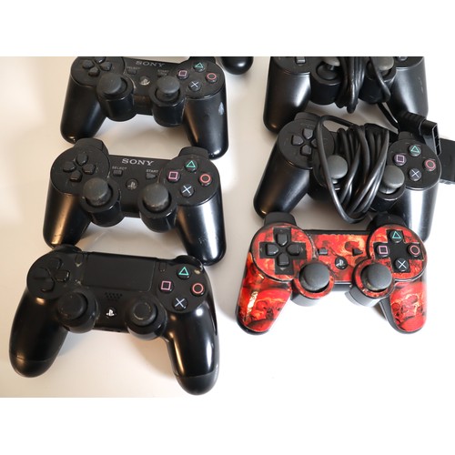 49 - 7 x Playstation Controllers wired & Wireless