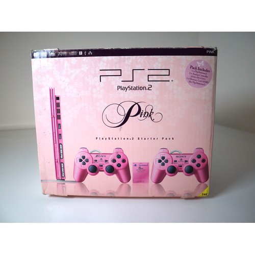 54 - Unused Playstation 2 Pink Edition in original box, with all cables, 2 x controllers, instructions an... 