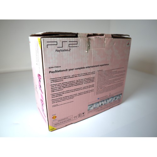 54 - Unused Playstation 2 Pink Edition in original box, with all cables, 2 x controllers, instructions an... 