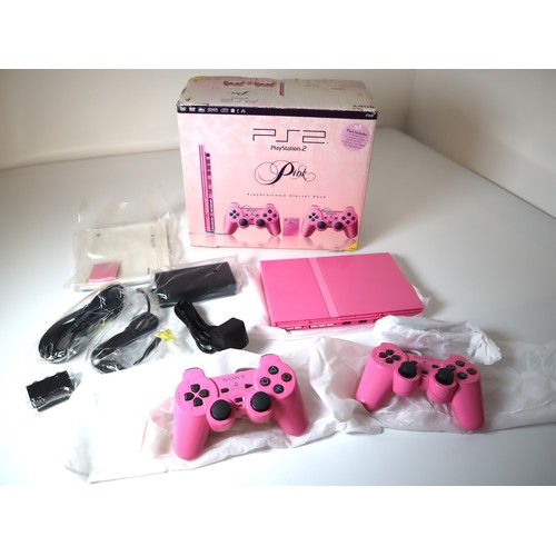 54 - Unused Playstation 2 Pink Edition in original box, with all cables, 2 x controllers, instructions an... 