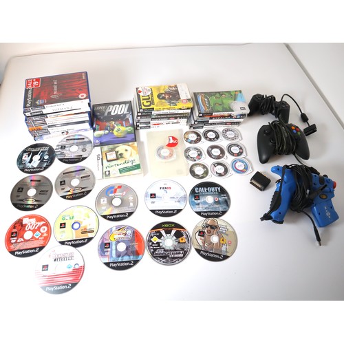 55 - A group of Playstation 2, PSP + other games some loose, includes Playstation, xbox controller & gun