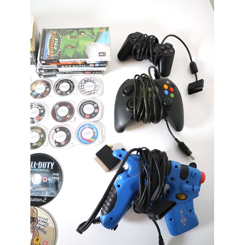 55 - A group of Playstation 2, PSP + other games some loose, includes Playstation, xbox controller & gun